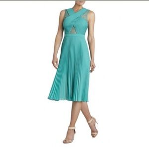 Bcbg max azria pleated turquoise dress.